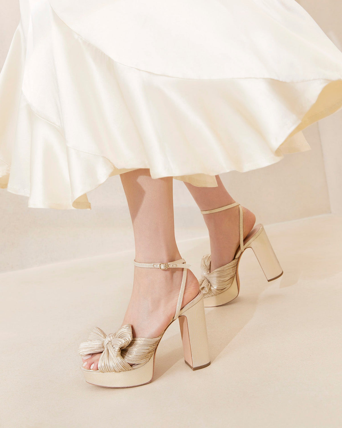 Natalia Platinum Platform Bow Heel